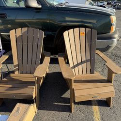 Brown Adirondack chairs