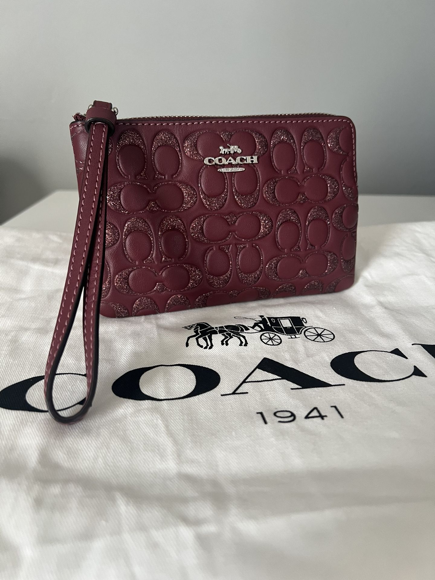 Coach Embossed Wristlet
