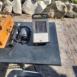 Solar electric fence Box Beer tap Antique telephone radio