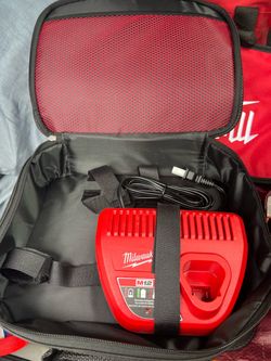 Milwaukee Charger and bag brand new