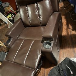 Massaging reclining leather chair
