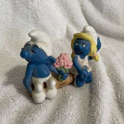 Smurf And Smurfette Statue