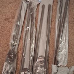 4 New Curtain Rod In The Plastic. 30-84 Inches 