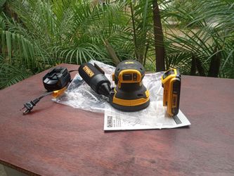 DeWalt.  20 v  new XR. Sander.  Variable speed.   W battery charger
