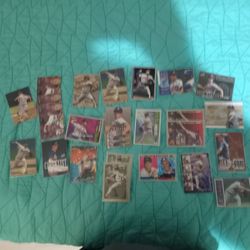 28 Various Greg Maddux Baseball Cards