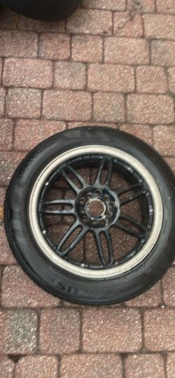 215/55R17 Kumho Tire & 17" Rim (OBO)