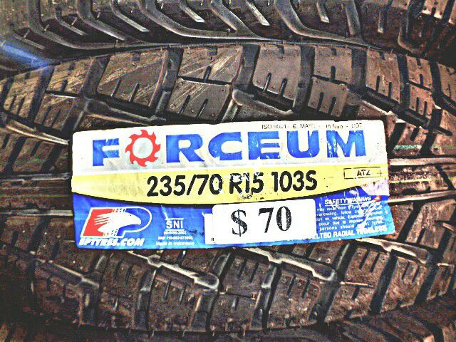 235 70 15 New Tire
