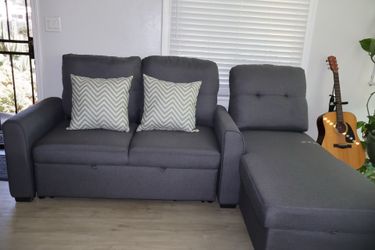 Like New Sleeper Sectional Couch w/ Storage & Pull-Out Bed
