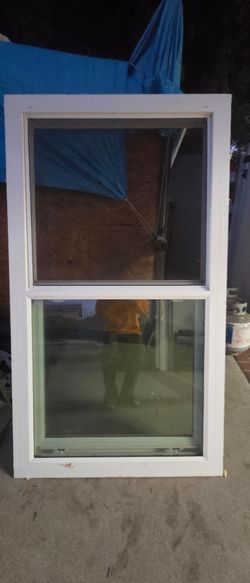 Vertical window ventana retro fit