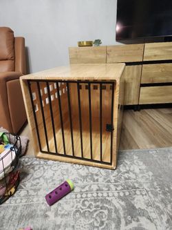wooden dog crate furniture piece that doubles as an end table or side table,