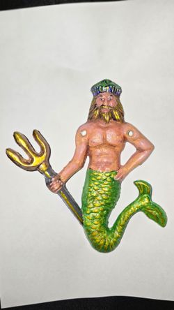 3- Cast Iron Mermaids $75.