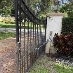 Electric gate noisy or moving uneven? Chain, motor, sensors, and full gate issues