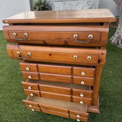 Antique chest of drawers with many drawers