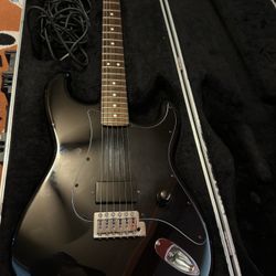 Black Fender Stratocaster Electric Guitar