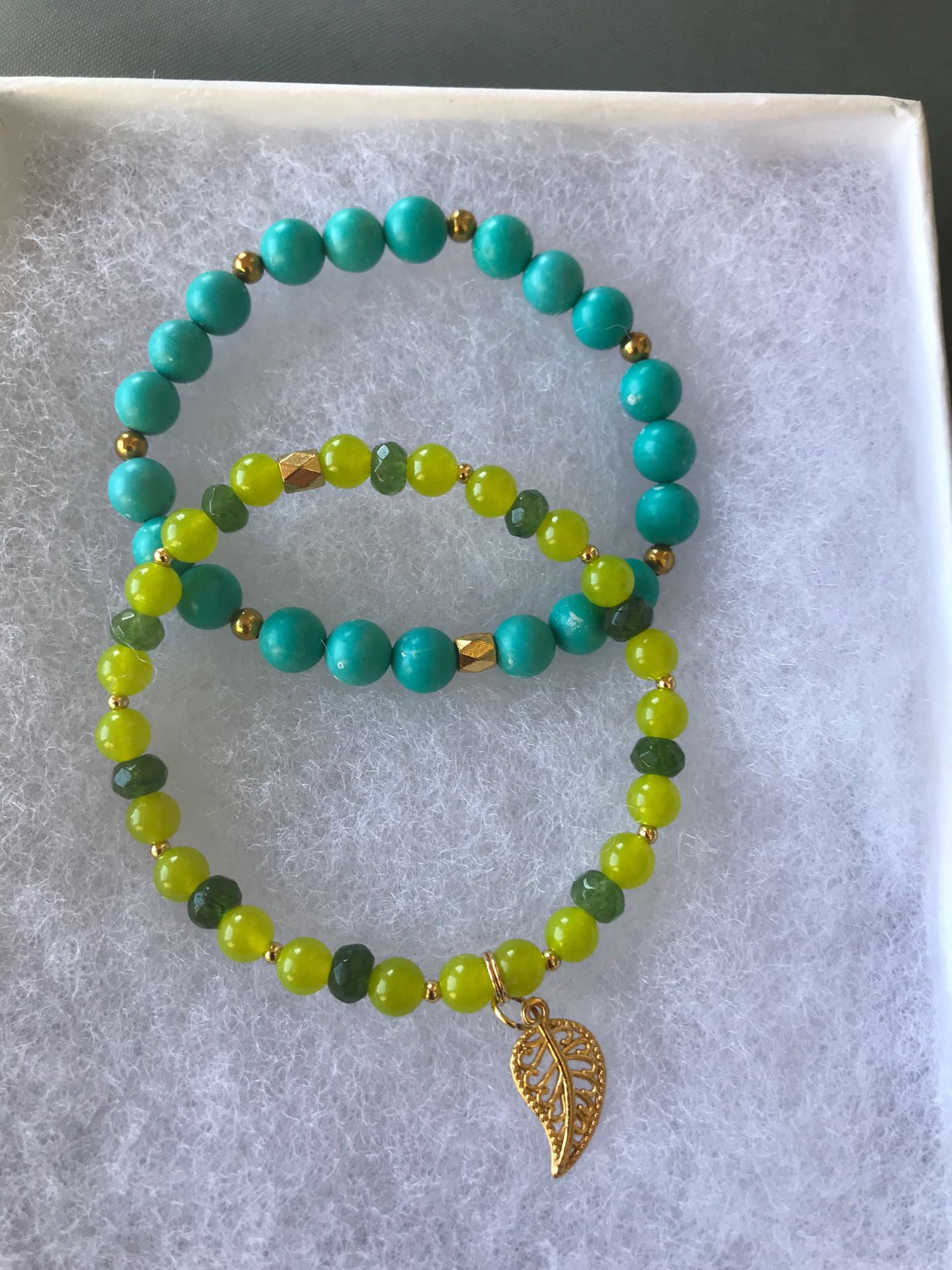 Peridot jade and and turquoise bracelets with leaf charm