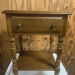 Vintage Maple Solid Wood  Nightstand  With One Drawer And Shelf. Used in good condition with some minor cosmetic blemishes. These blemishes are in the