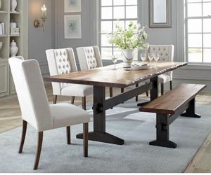 Dining table with cream tufted  chairs and bench