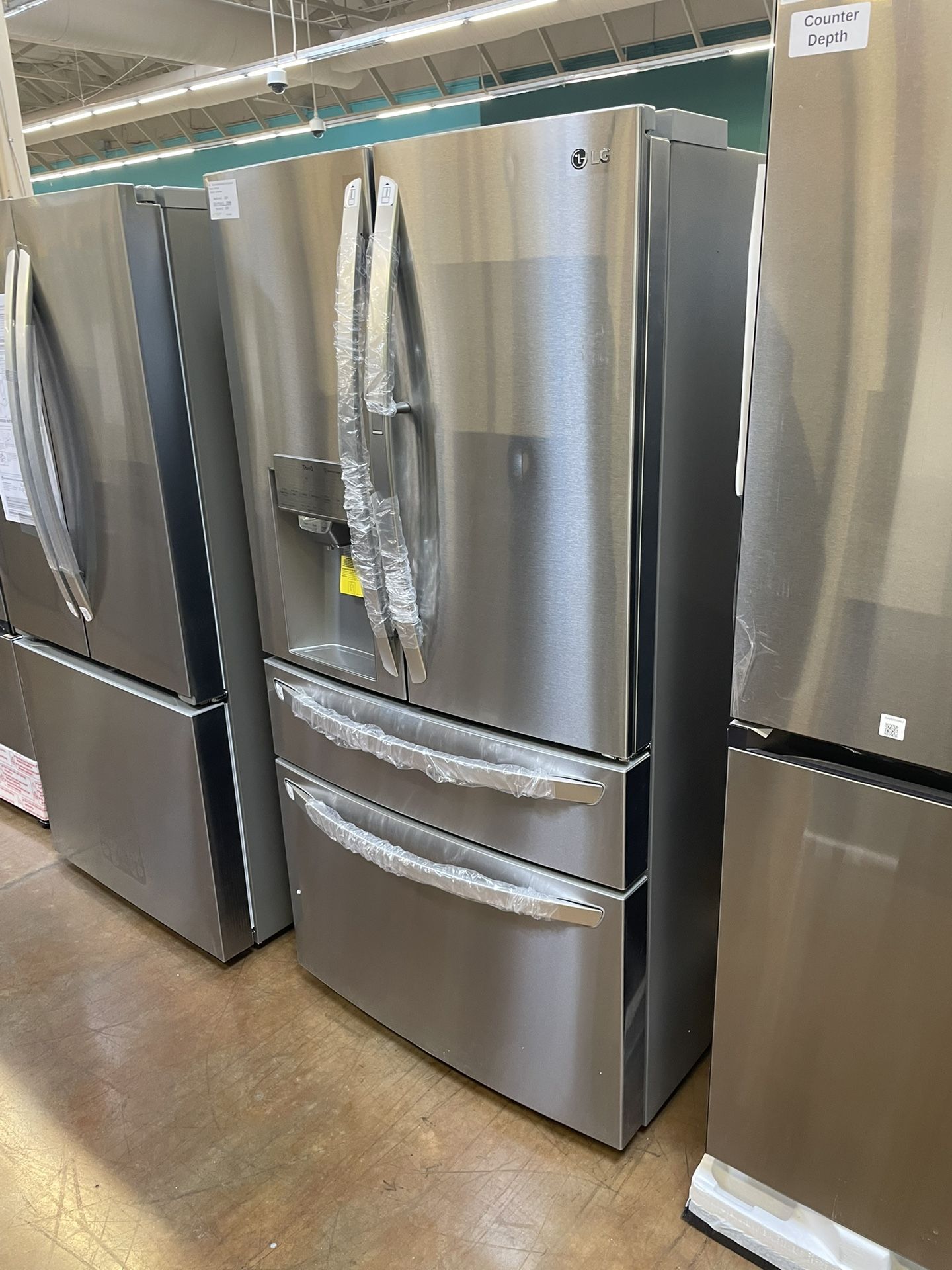 French style four-door refrigerator LG 36 inch wide stainless steel with door in door feature