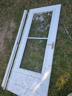 Door with sliding glass window