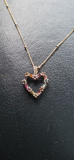 Gold Necklace With A Gold & Stone Pendant