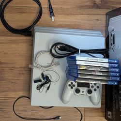 PS4 Pro Console Bundle - Glacier White (1TB) w/ 6 Games!