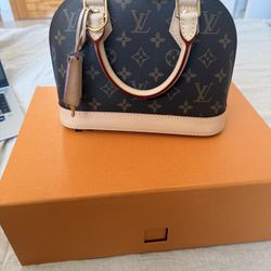Louise Vuitton Alma BB Monogram NEW with Receipt, Box, Strap, and Travel Bag