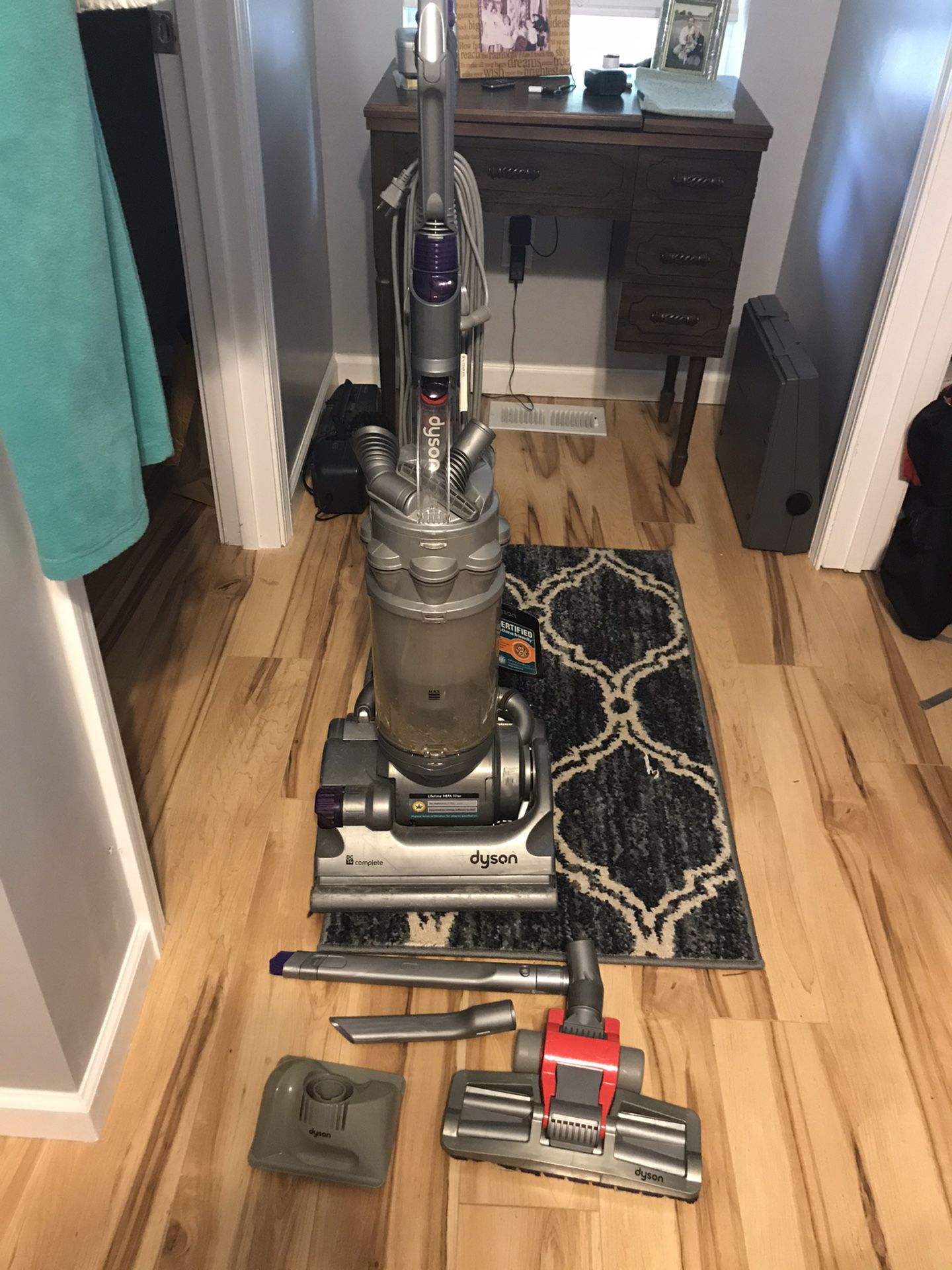 Dyson Complete, less than1yr old, with extra attachments, New it was over $400.