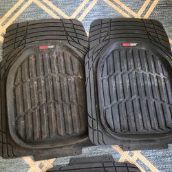 Floor mats for a truck