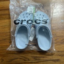 Crocs M7 W9