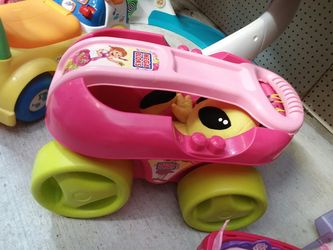 Little cart and weird stuffed doll