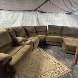 Three Electric Recliner Brown It Has Two Cupholders Of Storage And Two Lights