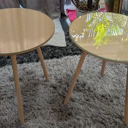 Wooden Round Action Tables With Tempered Glass Tops.