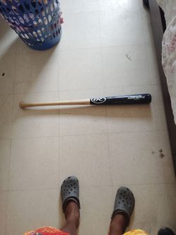 Rawlings hard maple pro baseball bat.