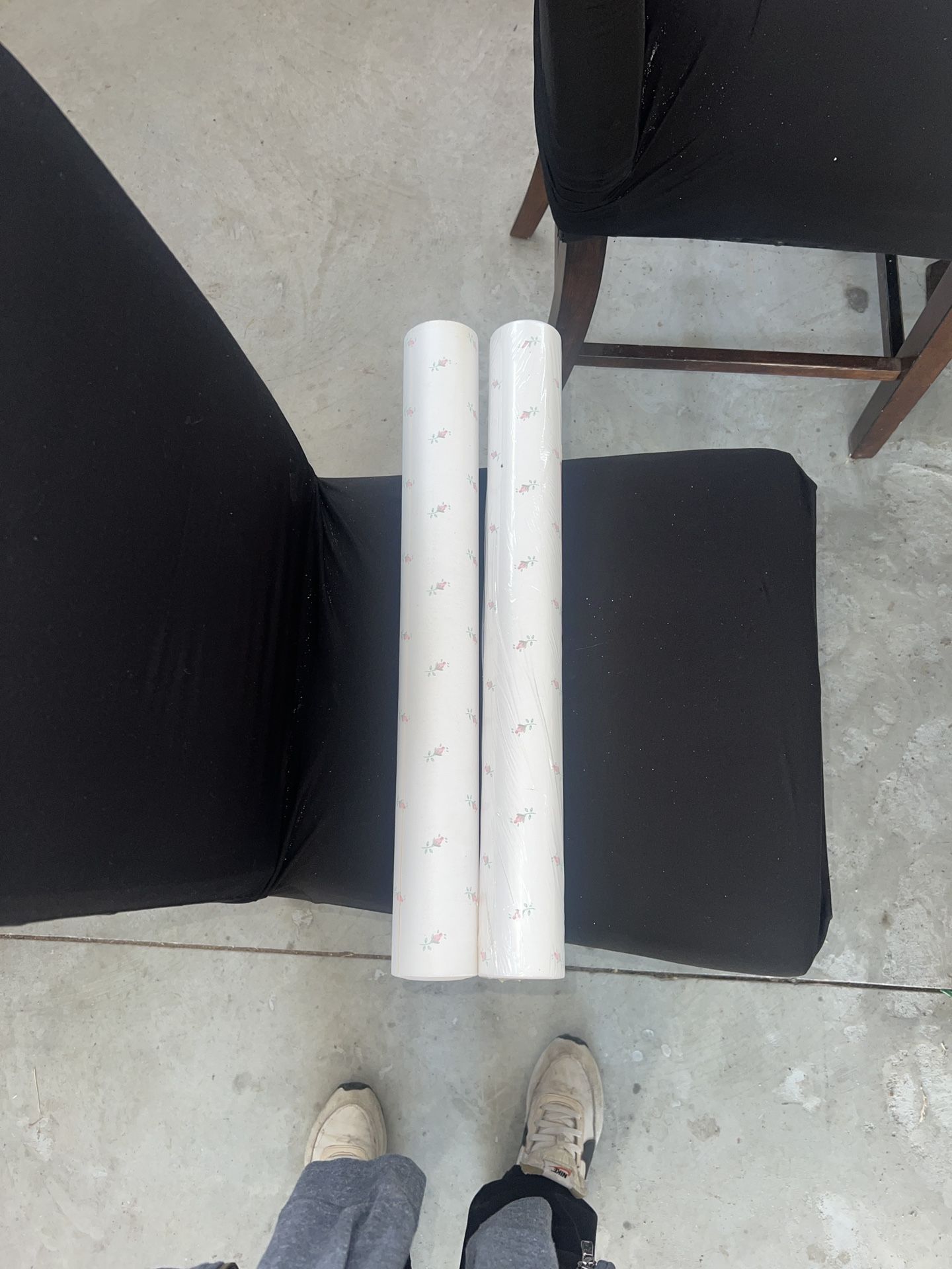 Taylor wallcoverings two rolls pre-trimmed peelable floral pattern. One roll has been opened