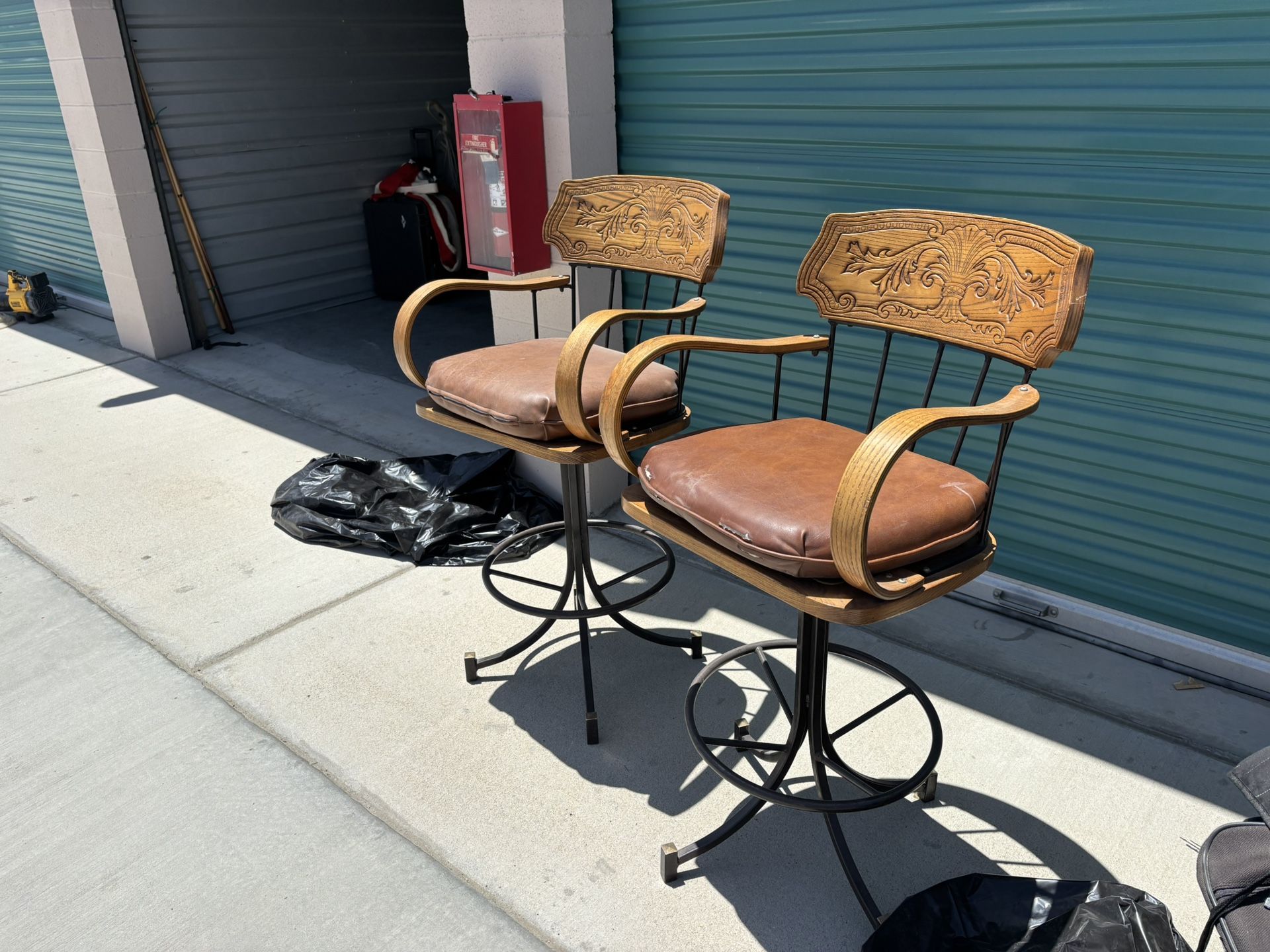 Two Swivel Oak Bar Stools