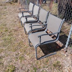 FOUR NICE MATCHING METAL PATIO CHAIRS 