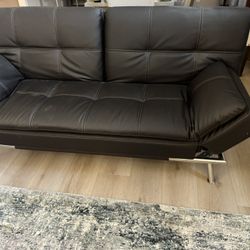 Full size sleeper sofa bed futon. Looks brand new @75” x38” electronics.Sells now 749 Costco see pic