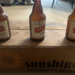 Sunshine Beer Case And Empty Bottles