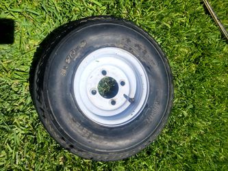 8" 4 lug 4 x 4" bolt circle, steel white wheel and tire