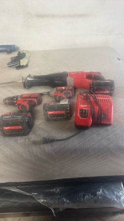 Milwaukee drills and saw zall with charger