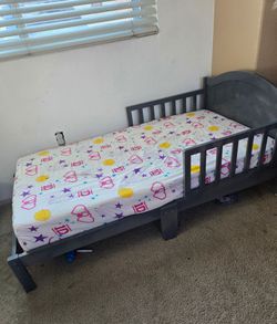 Toddler bed gray color  with mattress