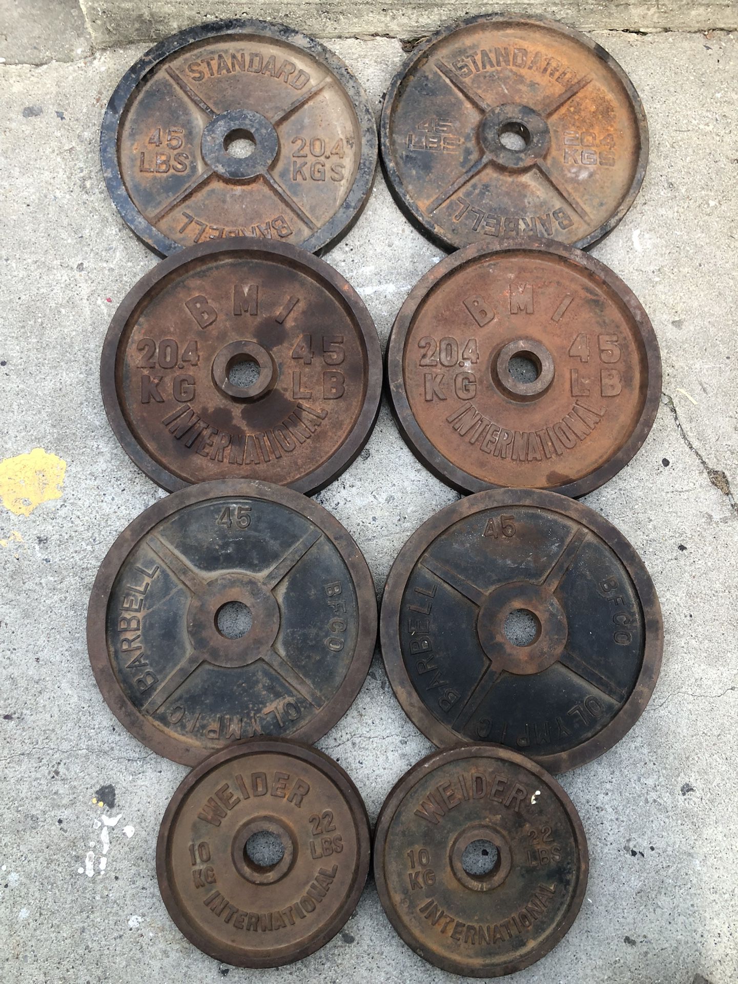 Olympic Weights Selling a Total Of 314lbs For $200 firm. There rusty but there solid weights