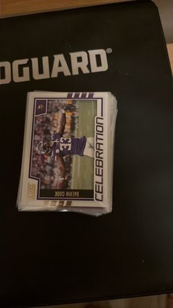 Stack of football card inserts
