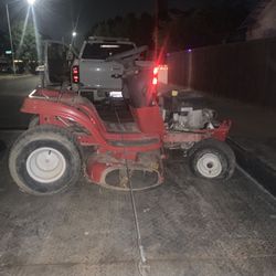 Riding Lawnmower Tractor, As Is Needs Starter With Bagger  With Baggers