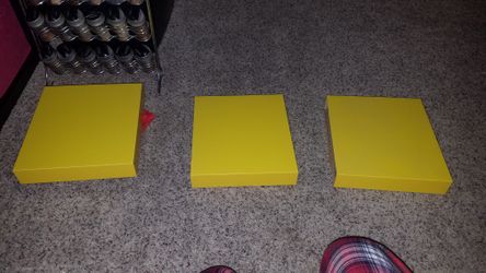 3 yellow ikea shelves