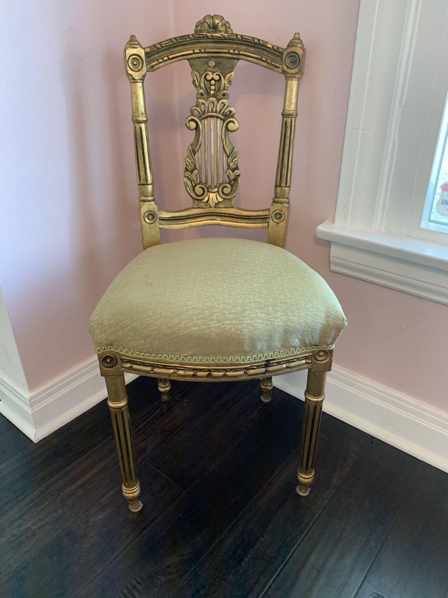 Super cute antique chair with gold paint. Measurements shown