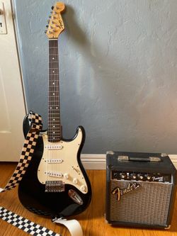 Squier Strat Electric Guitar and Fender Frontman 10G Amp
