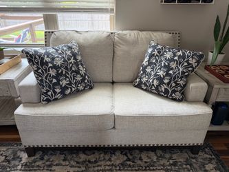 Beige Linen Loveseat and Sofa with Nailhead Trim