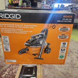 RIDGID
4 Gal. 5.0 Peak HP Portable Shop Vacuum Wet Dry Vac with Fine Dust Filter, Locking Hose and Attachments WD4070