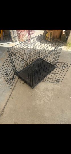 Dog cage 30”long  19” wide 21” tall